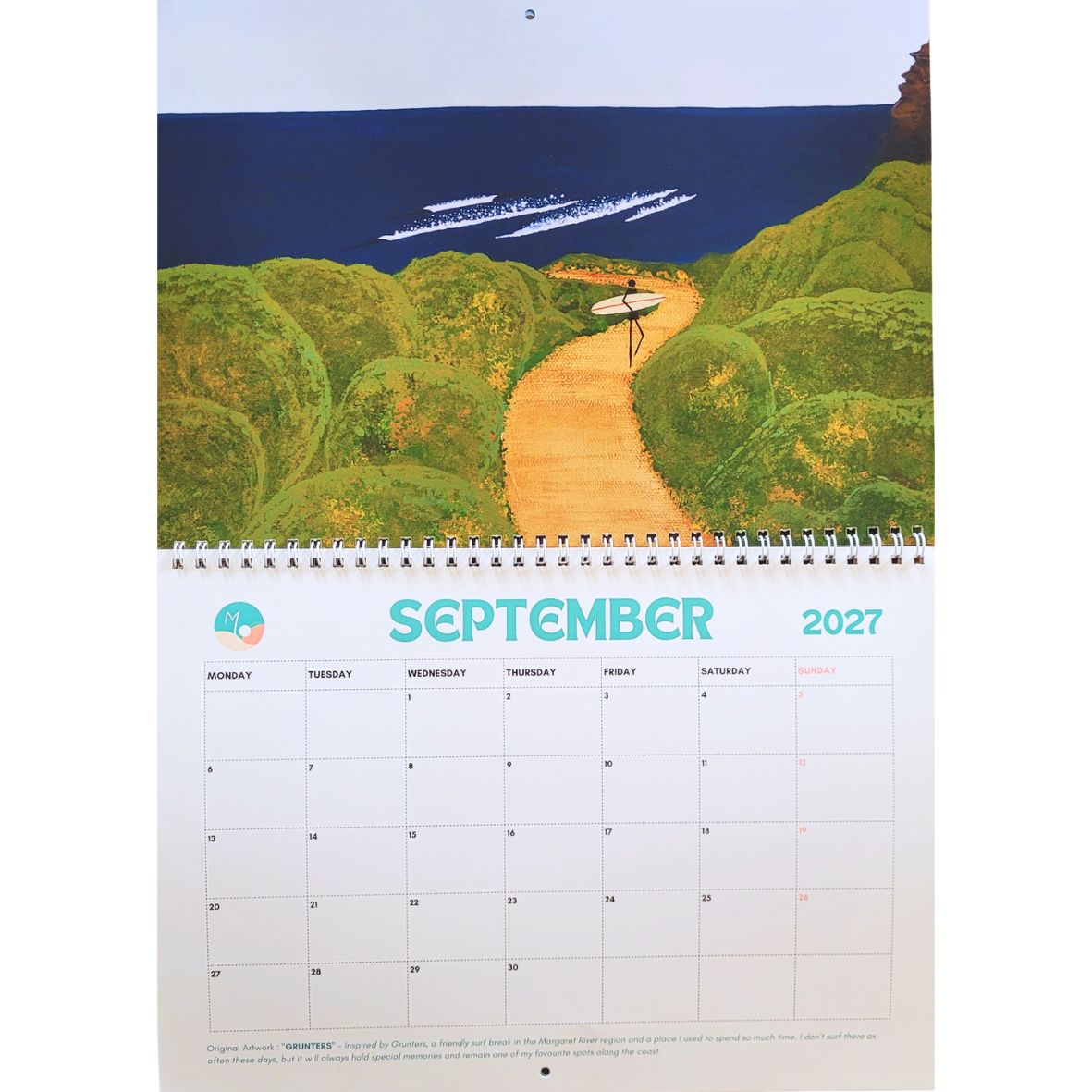 A spiral-bound 2027 calendar page featuring a scenic illustration of a coastal path winding through green hills toward the ocean, with a September 2027 calendar grid below.