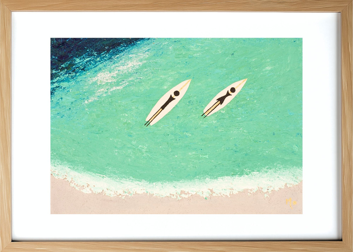 Saturday captures the excitement of chasing waves with someone special. Featuring a couple paddling side by side on their shortboards, this artwork celebrates the thrill of surfing, shared adventures and the freedom that comes from spending time in the ocean. Framed in light wood